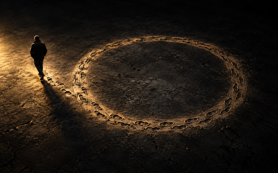 An aerial view of a man walking toward a glowing circular trail of his own footprints that loops endlessly back on itself, representing the same argument looping without resolution